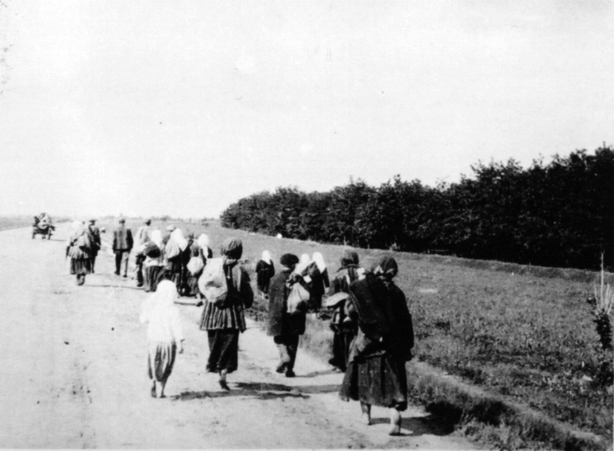 Hungry peasants leave the village in search of food in the city