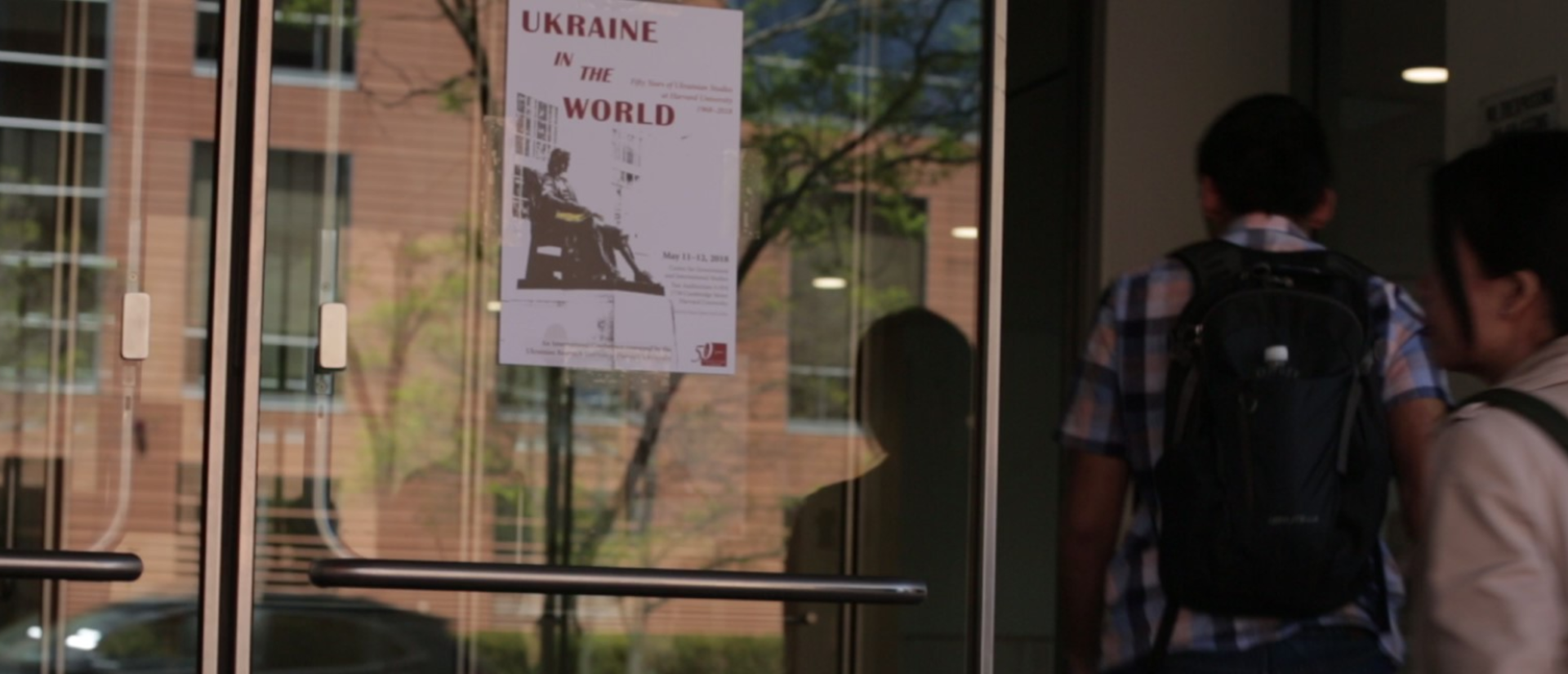 woman walking into building